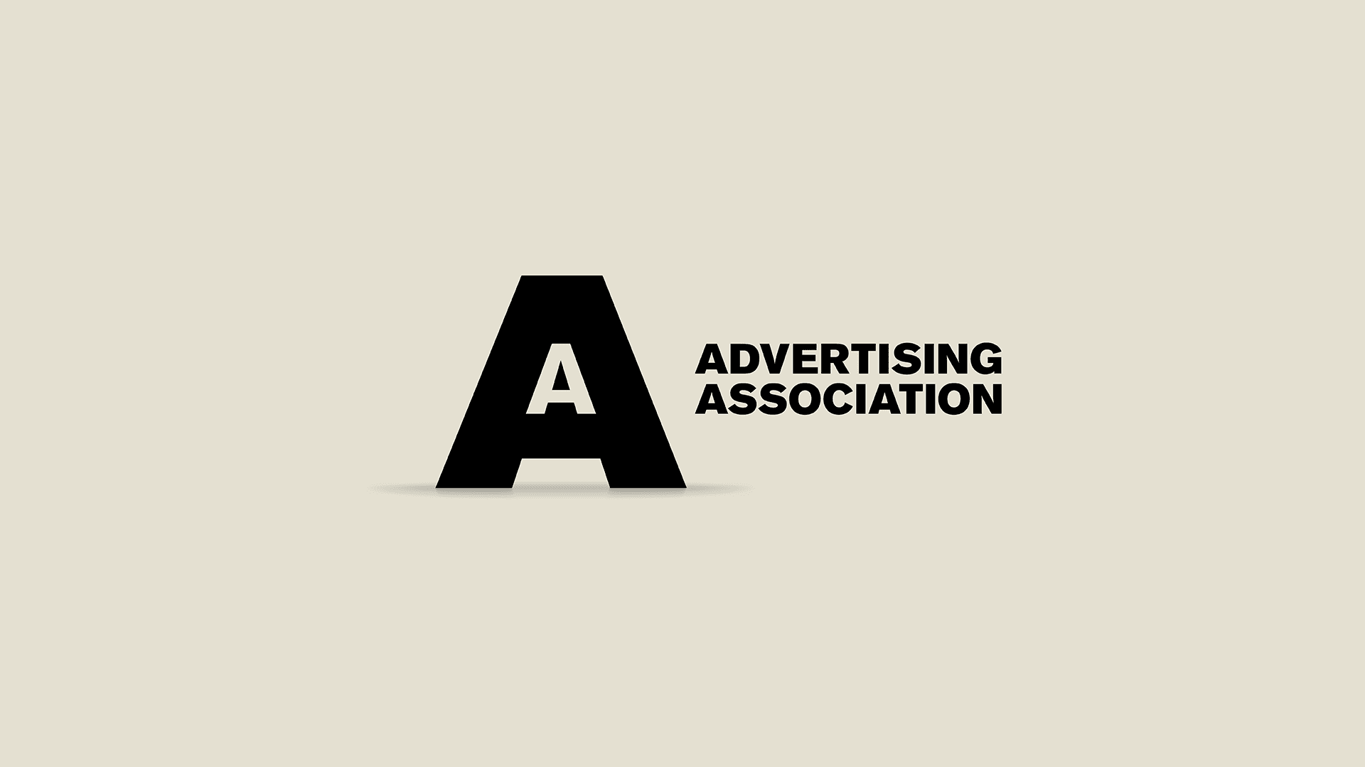 The The Advertising Association Logo in black on a beige background