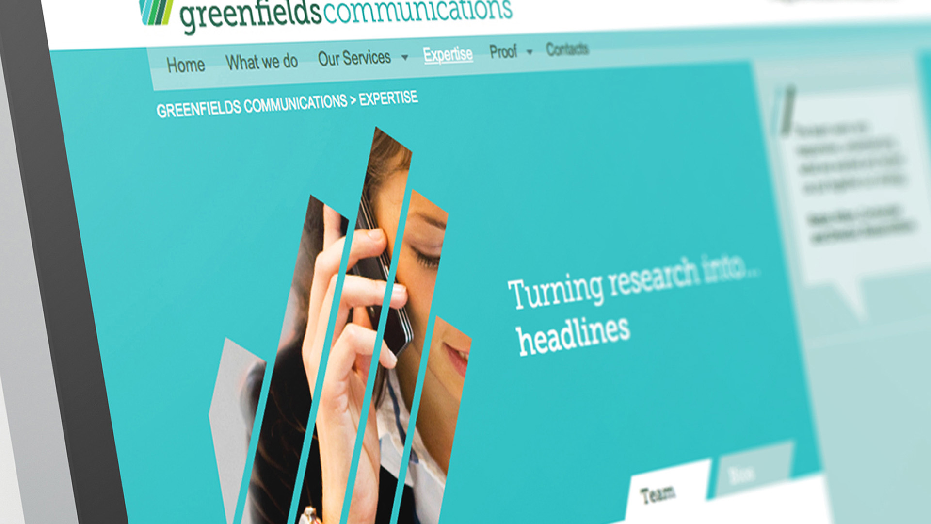 A computer monitor displaying the Hero Image on the Greenfields Communications Website Homepage