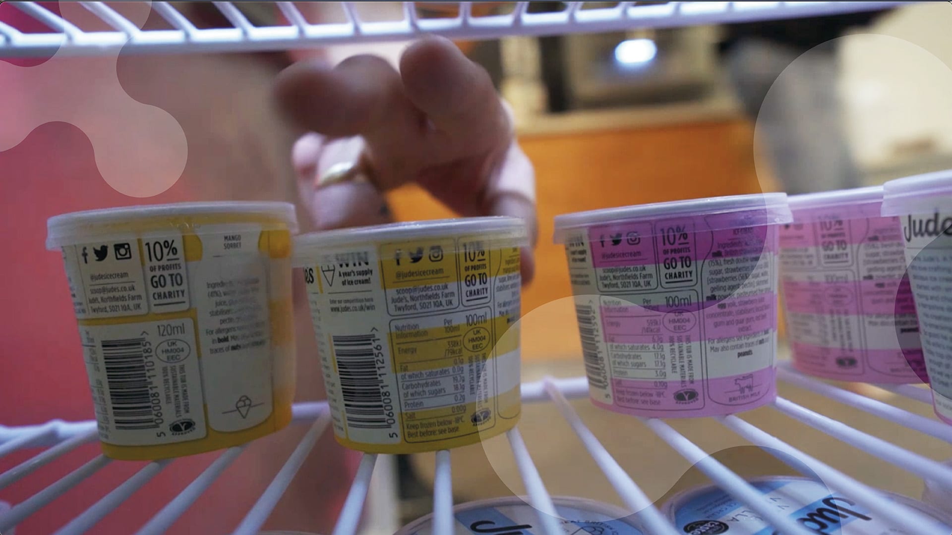 A photo of a hand grabbing an ice cream tub from the inside of a freezer, in a shot for the PR Academy video