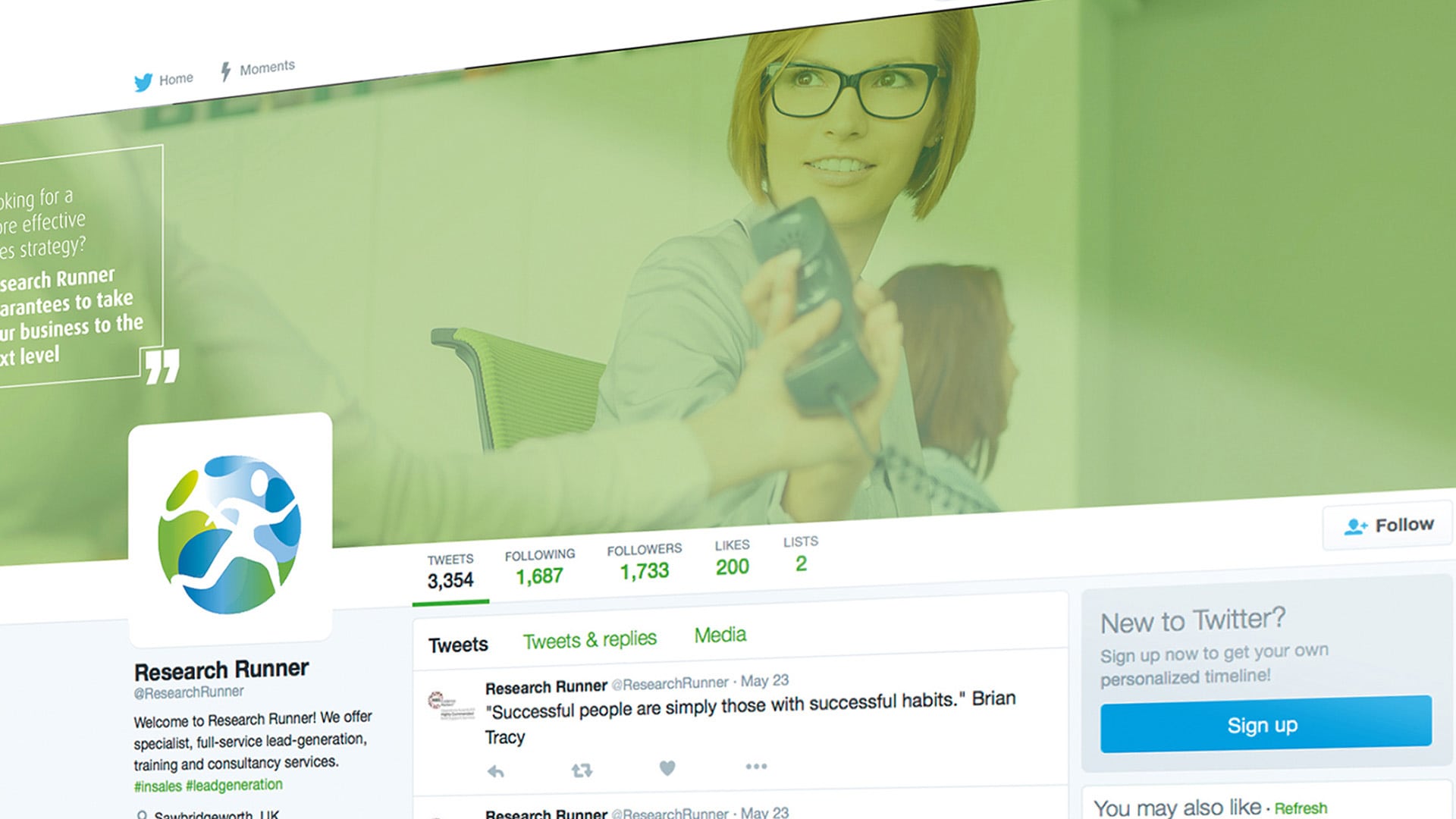 A close-up section of a Research Runner Twitter Profile Banner showing a photograph of a woman with glasses on the telephone