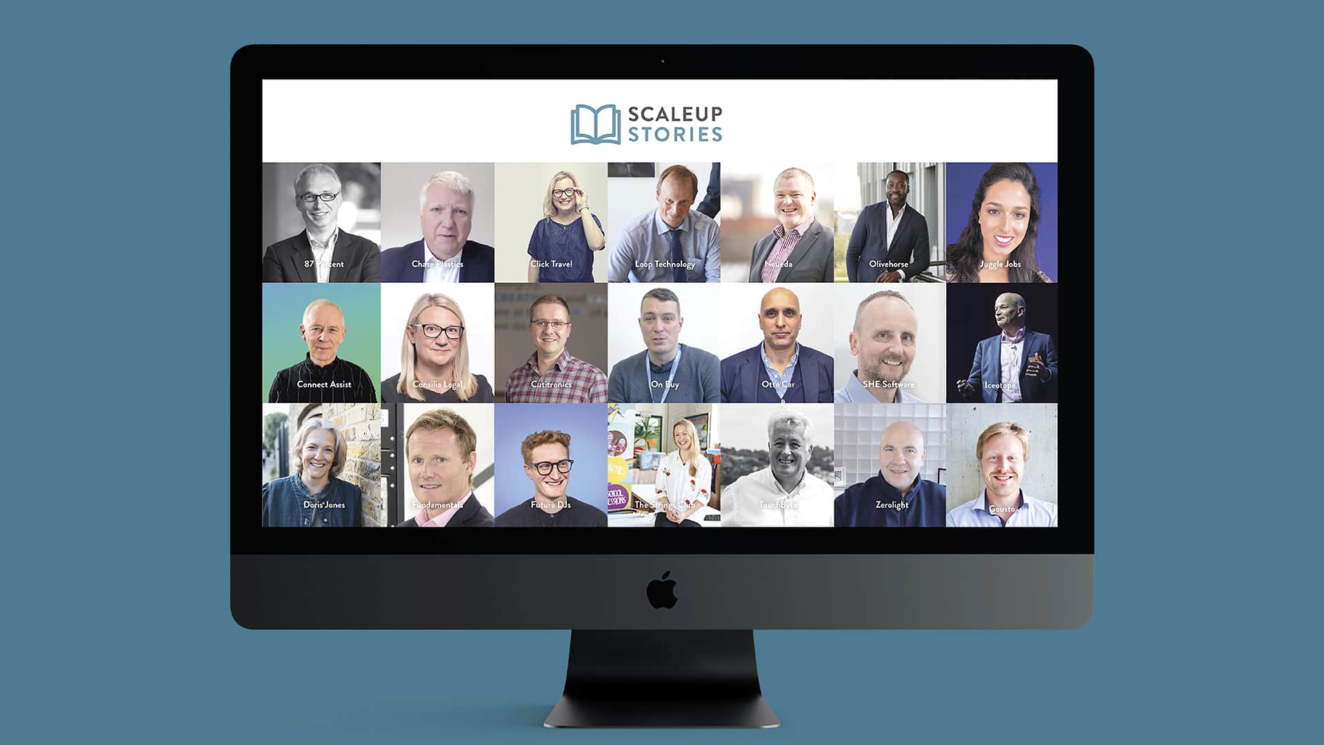 A photo of an iMac displaying the ScaleUp Institute Annual Review Scaling Business Leaders Headshots page